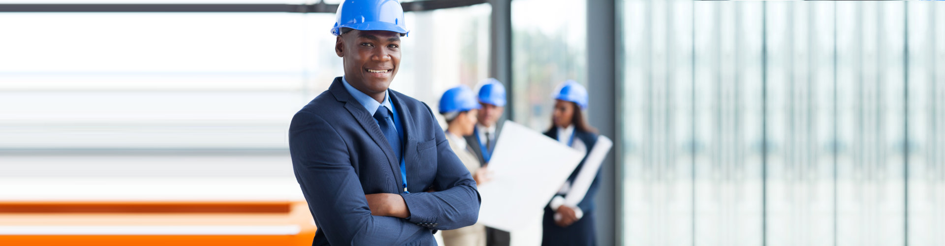 male construction manager arms folded