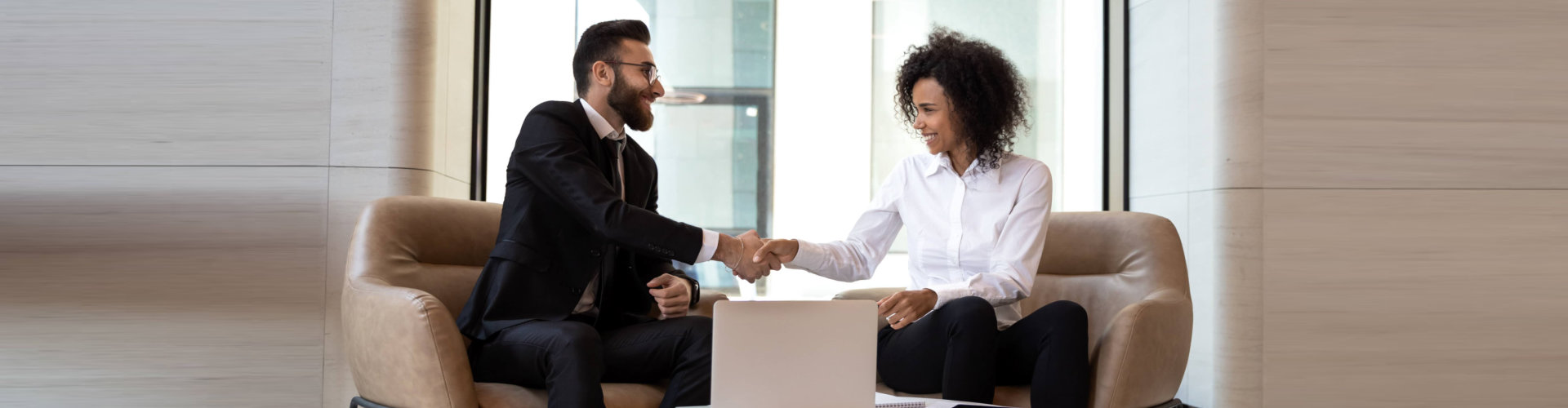 two people shaking hands